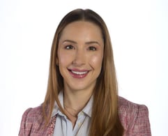 headshot for physician assistant Jennifer Sweetman, a young woman with honey-colored hair parted in the middle